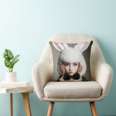 A woman wearing a rabbit hat and a black bow tie クッション (椅子)