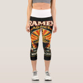 A women’s light blue denim jacket featuring a bold カプリレギンス (正面)