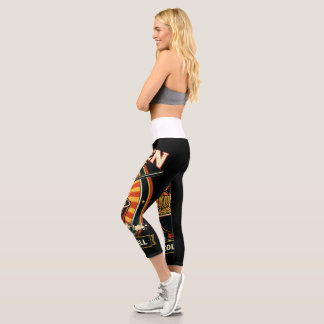 A women’s light blue denim jacket featuring a bold カプリレギンス