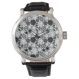 A wristwatch with a detailed gear-patterned face 腕時計