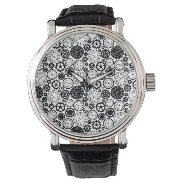 A wristwatch with a detailed gear-patterned face 腕時計 (正面)