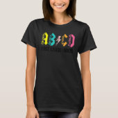 ABCD First Grade Rocks Back To School 1st Grade Te Tシャツ (正面)