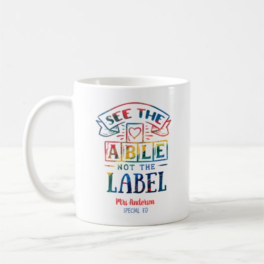 Able Not the Label自閉症先生を表示 コーヒーマグカップ (左)