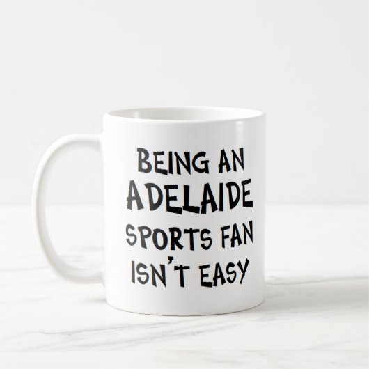 adelaide sports fan, being コーヒーマグカップ (左)