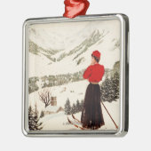 Adelbodenポスターを見落としている女性のスキーヤー メタルオーナメント (左)