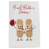 Adhesive Bandage Cheerleaders On White ミディアムペーパーバッグ (正面)