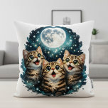 Adorable Moon Gazer Kittens - Sparkling Starlight クッション<br><div class="desc">Bring whimsical charm and cozy comfort to any space with our "Adorable Moon Gazer Kittens" pillow! This enchanting design features three wide-eyed, tabby kittens gazing up in wonder at a luminous full moon, surrounded by a magical sprinkle of twinkling stars. Their happy, expressive faces and vibrant green eyes will melt...</div>