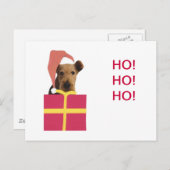 Airedaleテリアのサンタの帽子のギフト用の箱 シーズンポストカード (正面/裏面)