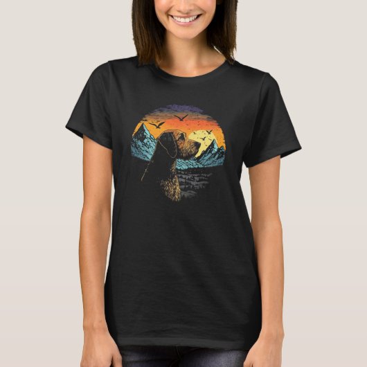 Airedale Terrier Dog and Sun Rising Over Mountains Tシャツ (正面)