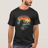 Airedale Terrier Dog and Sun Rising Over Mountains Tシャツ (正面)
