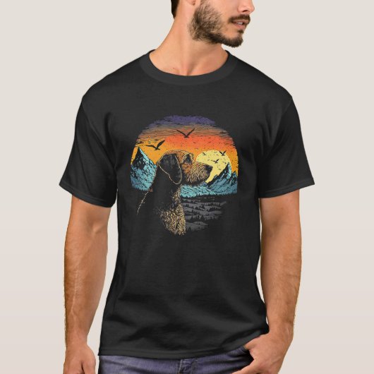 Airedale Terrier Dog and Sun Rising Over Mountains Tシャツ (正面)