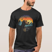 Airedale Terrier Dog and Sun Rising Over Mountains Tシャツ (正面)