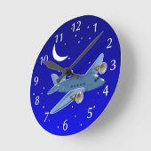 Airplane flying at night with moon & stars. Pilot ラウンド壁時計 (傾斜)