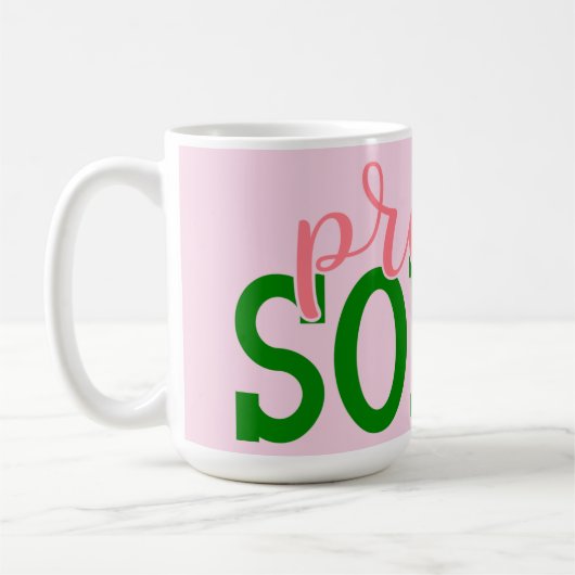 AKAが注目するピンクと緑のかわいらし大騒ぎ  コーヒーマグカップ (左)