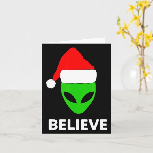 Alien Green Face Christmas Santa Hat Believe  カード (黄色い花)