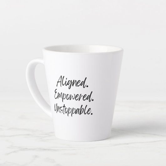 Aligned. Empowered. Unstoppable. カフェラテマグ (左アングル)
