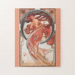 Alphonse Mucha Dance 1898 Art Nouveau Vintage ジグソーパズル<br><div class="desc">This work like many of his others was inspired by the beauty of nature. The circular backdrop features a shell pattern forming an arch above the lone woman. Autumn colors browns, yellows and orange and falling leaves blow in the wind drawing your eyes to the lovely woman. She seductively glances...</div>
