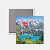 Alpine lake Oeschinensee in Switzerland with flag マグネット (正面/裏面)