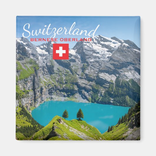 Alpine lake Oeschinensee in Switzerland with flag マグネット (正面)