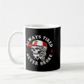 Always Tired Never Broke Funny Skull (on Back)  コーヒーマグカップ (左)