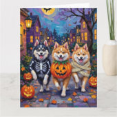 American Eskimo Dogs Trick-or-Treating Halloween カード (正面)