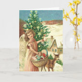 Angel bringing Christmas gifts and presents カード (黄色い花)