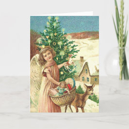 Angel bringing Christmas gifts and presents カード