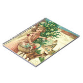 Angel bringing Christmas gifts and presents ノートブック (左側)