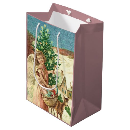 Angel bringing Christmas gifts and presents ミディアムペーパーバッグ (正面アングル)