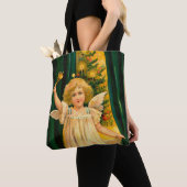 Angel ringing the bell for Christmas time トートバッグ (クローズアップ)