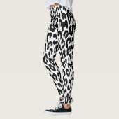 Animal print blanco y negro レギンス (左)