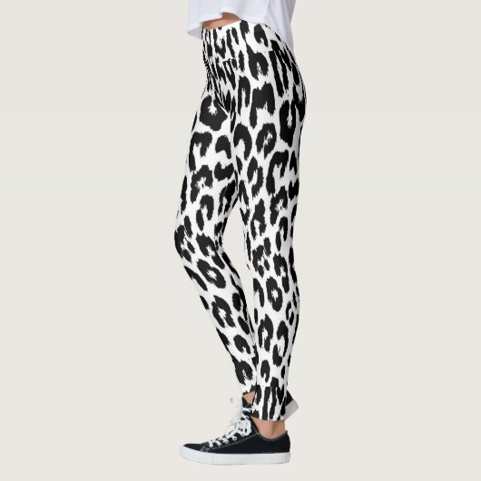 Animal print blanco y negro レギンス (左)