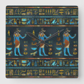 Anubisのエジプトの金ゴールドの、青および赤いガラス スクエア壁時計 (正面)