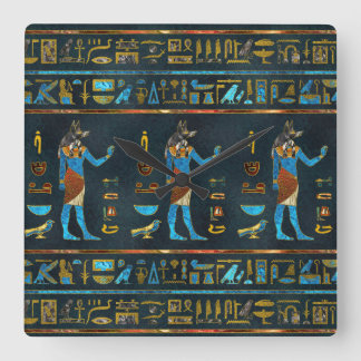 Anubisのエジプトの金ゴールドの、青および赤いガラス スクエア壁時計