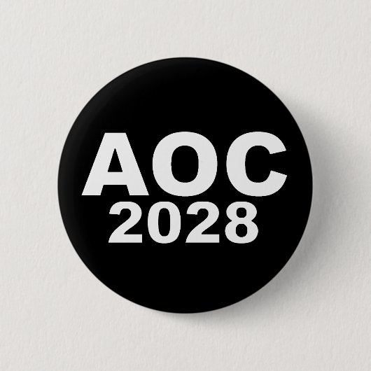 AOC 2028 缶バッジ (正面)