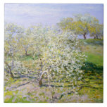 Apple Trees in開花(by Claude Monet) タイル<br><div class="desc">このデザインは印象派絵画のアーティスフランスのトであるクロード・モネ(1840-1926)の作品を特集している。パリの北西にセーヌ川の村であるアルジェンテウイルの美しい緑の風景を見せるが、それは印象派の画家たちのために集まる場所だっお気に入りのた。明るい夏の日に美しい白い花で咲くリンゴの木を見せる。オリジナル工事は1873年に完成。</div>