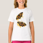 Artistic Watercolor Monarch Butterfly Nature Art Tシャツ<br><div class="desc">The design features two vibrant monarch butterflies in mid-flight, rendered with artistic paint splatters in warm shades of orange and yellow. This nature-inspired graphic captures the delicate elegance of spring wildlife. It makes a wonderful gift for gardeners, entomology enthusiasts, nature lovers, or anyone who appreciates the symbolism of freedom and...</div>