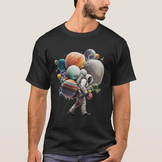 Astronaut carrying Planets and Moons in Space Tシャツ (正面)