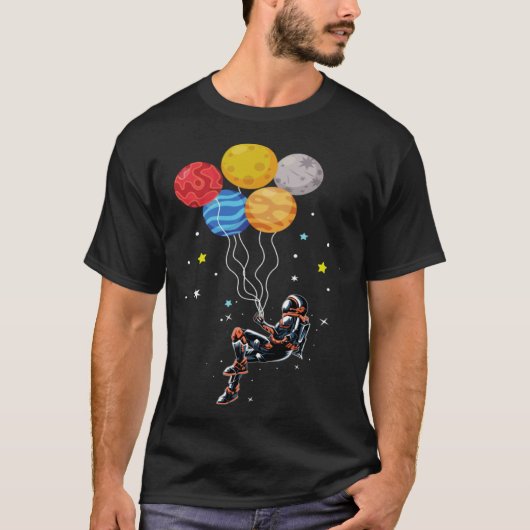 Astronaut Holding Planet Balloons The Spaceman s T Tシャツ (正面)