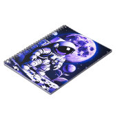 Astronaut on top of a puzzle ノートブック (左側)