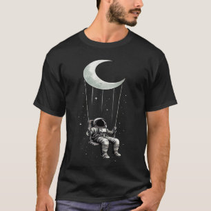 Astronaut Swinging Under the Moon T-Shirt   ユニセックス Tシャツ