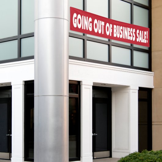 B.廃業 横断幕 (ビルの外側)