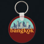 Bangkok Thailand Vintage City Skyline Cityscape キーホルダー<br><div class="desc">Vintage and retro city design with beautiful skyline, tourist attraction and cityscape art. Cool skyscraper and building silhouette illustration merchandise for tourist and traveler. Perfect as souvenir to bring back home when travelling around the world. Save the memory of your travel and vacation with family and friends. Background color can...</div>