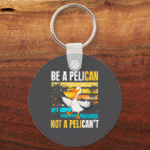 Be A Pelican Not A Pelican't Funny Bird Motivation キーホルダー (正面)