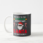 Be Nice To The Physician Istant Santa Is Watching  コーヒーマグカップ (左)