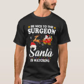 Be Nice To The Surgeon Santa Watching Xmas Tシャツ (正面)