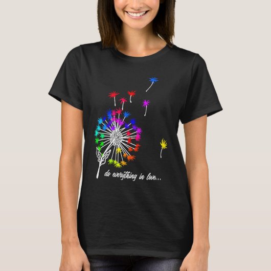 Beautiful dandelion with colourful spores flying a tシャツ (正面)