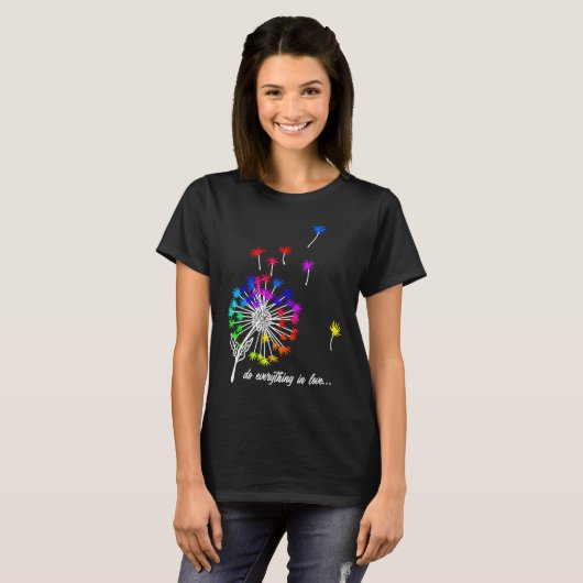 Beautiful dandelion with colourful spores flying a tシャツ (正面フル)