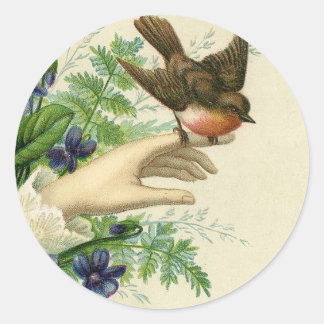 Beautiful hand with a bird and flowers ラウンドシール