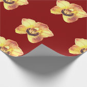 beautiful yellow orchid on a ruby red background ラッピングペーパー (角)